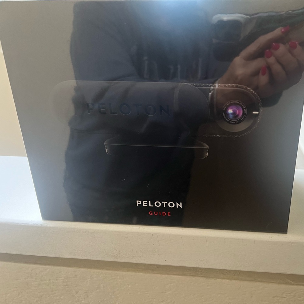 Peloton Guide. New/unused still in plastic wrap.